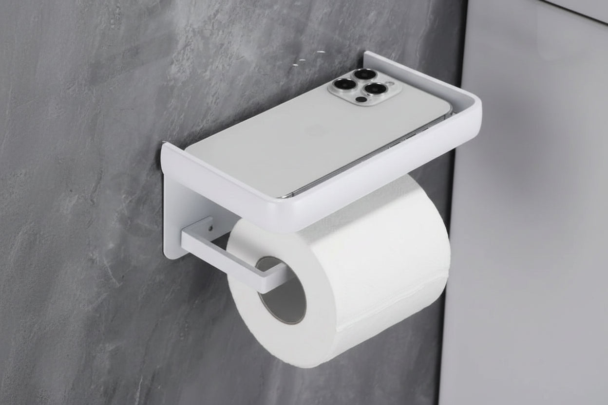 White roll paper holder with shelf mounted on a wall with text indicating punching installation.